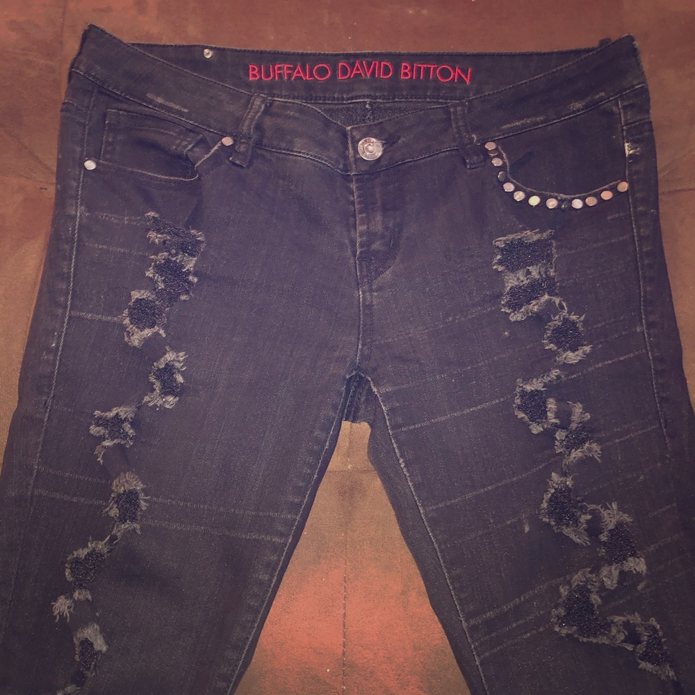 Black ripped buffalo jeans